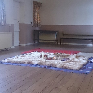 large alpaca rug with Altar in the middle